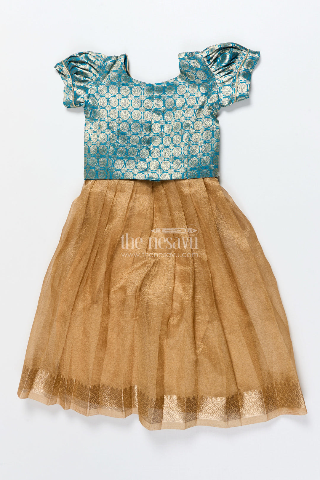 The Nesavu Pattu Pavadai Baby Girl Traditional Pattu Pavadai in Tissue Silk with Zari Finish Nesavu Nesavu baby girl golden tissue silk pattu pavadai with semi Banaras blouse for festive wear