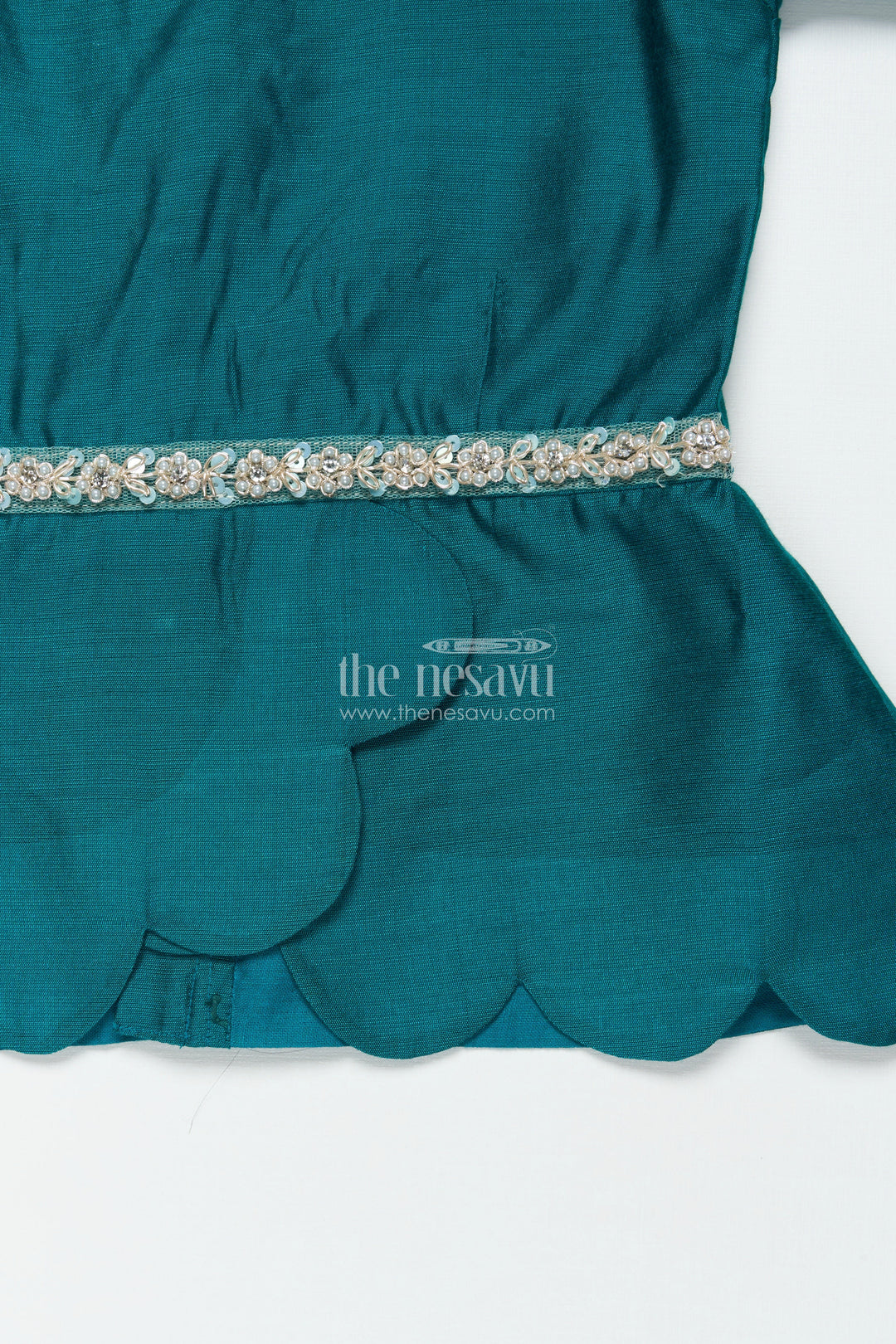 The Nesavu Pattu Pavadai Baby Girl Traditional Pattu Pavadai with Chanderi Yoke for Special Occasions Nesavu Nesavu baby girl pattu pavadai with chanderi yoke and Banaras skirt for traditional baby functions