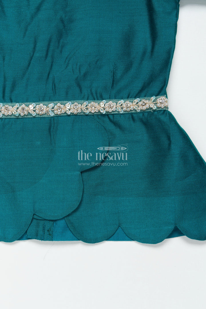 The Nesavu Pattu Pavadai Baby Girl Traditional Pattu Pavadai with Chanderi Yoke for Special Occasions Nesavu Nesavu baby girl pattu pavadai with chanderi yoke and Banaras skirt for traditional baby functions