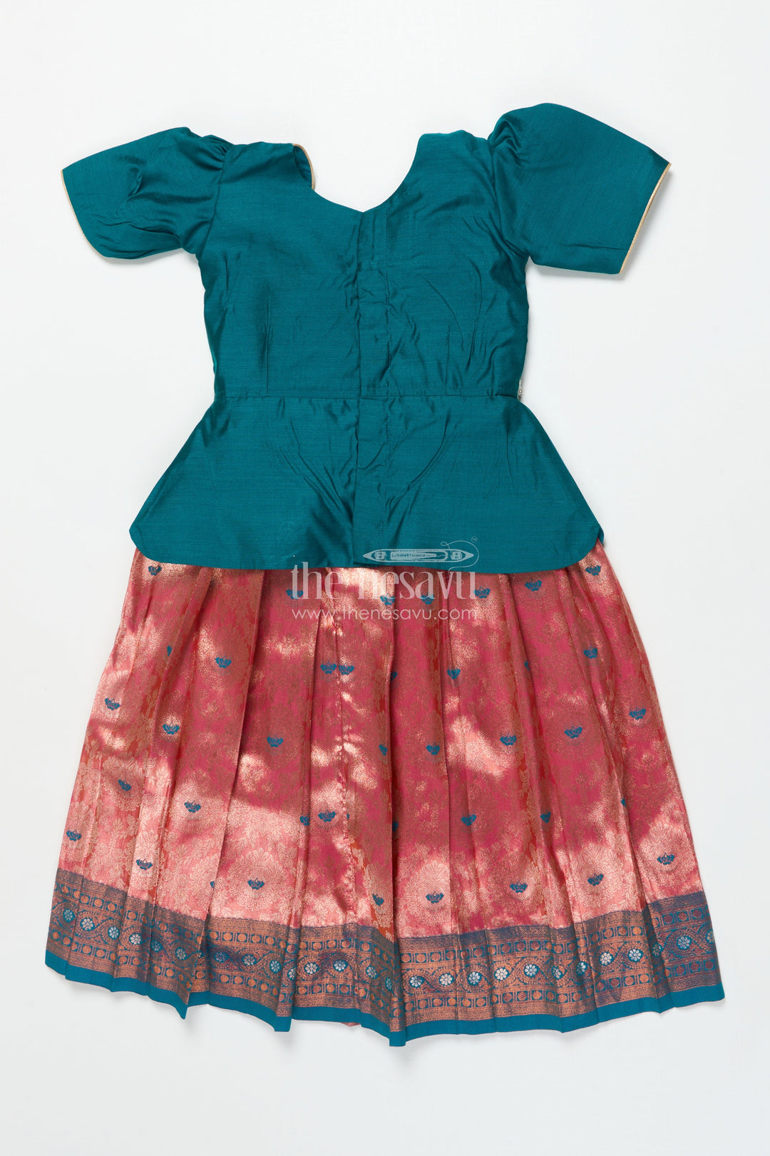 The Nesavu Pattu Pavadai Baby Girl Traditional Pattu Pavadai with Chanderi Yoke for Special Occasions Nesavu Nesavu baby girl pattu pavadai with chanderi yoke and Banaras skirt for traditional baby functions