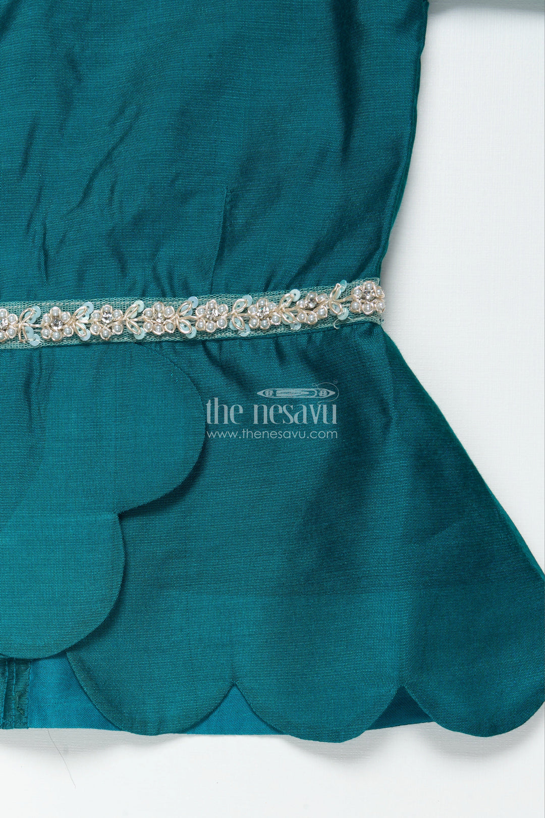 The Nesavu Pattu Pavadai Baby Girl Traditional Pattu Pavadai with Chanderi Yoke for Special Occasions Nesavu Nesavu baby girl pattu pavadai with chanderi yoke and Banaras skirt for traditional baby functions