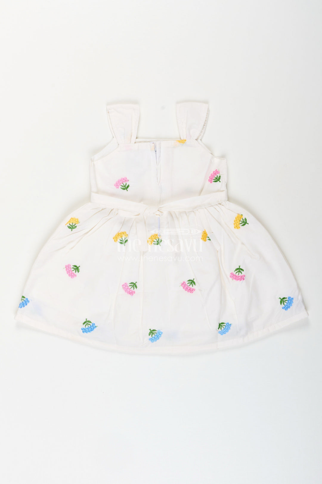The Nesavu Baby Cotton Frocks Baby girl white cotton frock with floral embroidery for casual outings Nesavu Nesavu baby girl white cotton frock with pastel floral embroidery for casual summer days