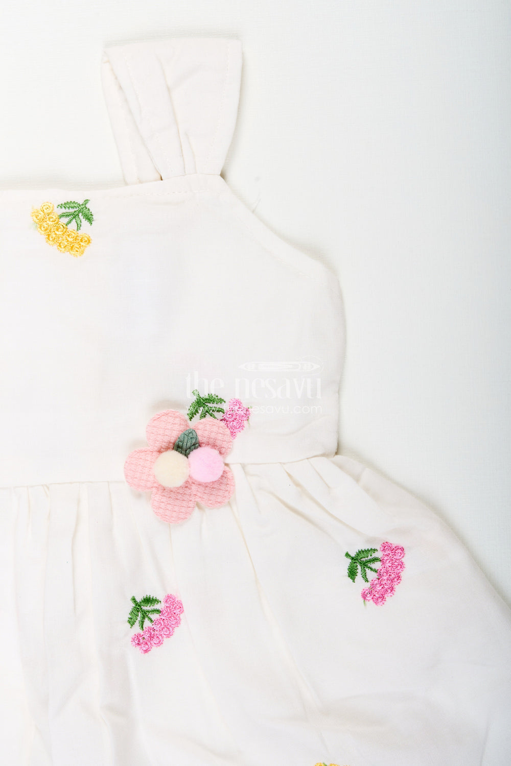The Nesavu Baby Cotton Frocks Baby girl white cotton frock with floral embroidery for casual outings Nesavu Nesavu baby girl white cotton frock with pastel floral embroidery for casual summer days