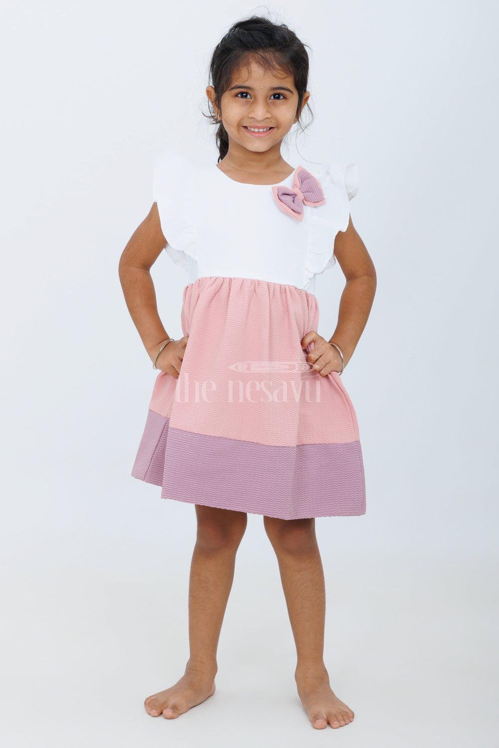 The Nesavu Baby Fancy Frock Baby Girls Beige Cotton White Frock with Color Block Design and Bow Accent for Family Gatherings Nesavu Nesavu Baby Girls Beige Cotton Frock Bow Detail Color Block Design Family Outings Playdates