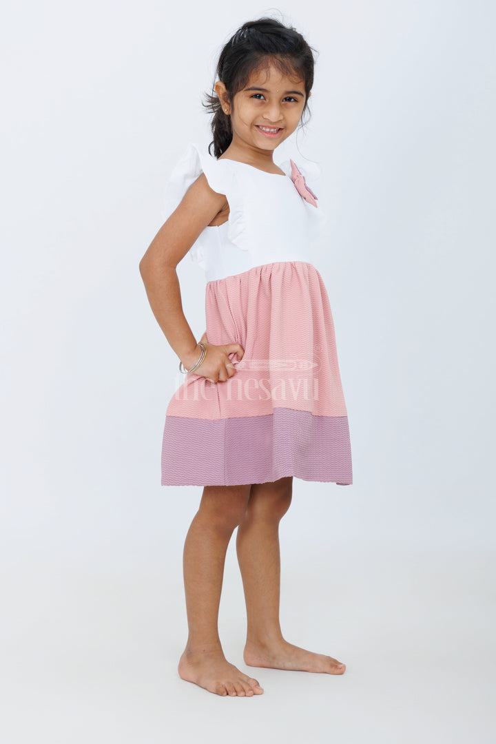 The Nesavu Baby Fancy Frock Baby Girls Beige Cotton White Frock with Color Block Design and Bow Accent for Family Gatherings Nesavu Nesavu Baby Girls Beige Cotton Frock Bow Detail Color Block Design Family Outings Playdates