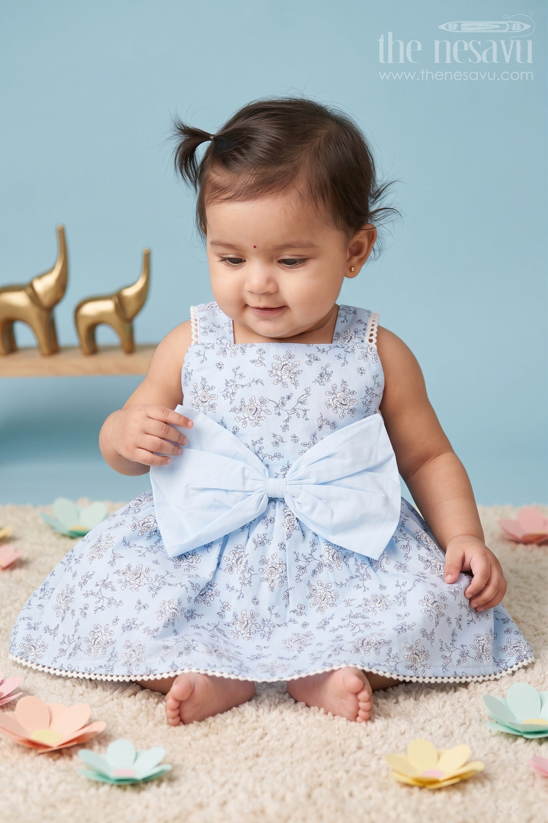 The Nesavu Baby Fancy Frock Baby Girls Blue Cotton Floral Frock with Large Bow and Lace Detailing for Casual Outings Nesavu 16 (1Y) / Blue BFJ640A-16 Nesavu Baby Girls Blue Cotton Frock Floral Print Bow Accent Lace Details Summer Parties