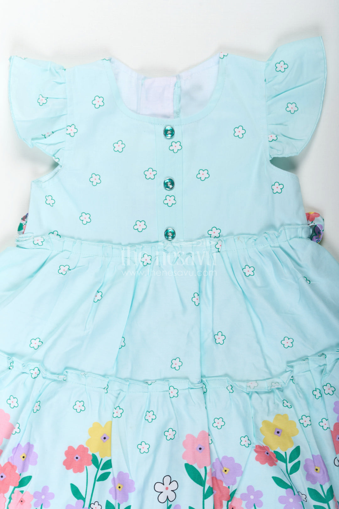 The Nesavu Baby Cotton Frocks Baby Girls Cotton Eid Frock with Pastel Green Tone and Bright Floral Border for Festive Comfort Nesavu Nesavu Baby Girls Eid Frock Cotton Colorful Floral Border Festive Green Hue