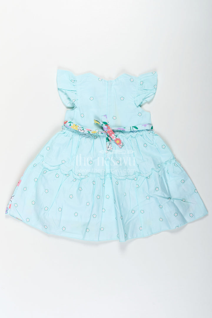The Nesavu Baby Cotton Frocks Baby Girls Cotton Eid Frock with Pastel Green Tone and Bright Floral Border for Festive Comfort Nesavu Nesavu Baby Girls Eid Frock Cotton Colorful Floral Border Festive Green Hue