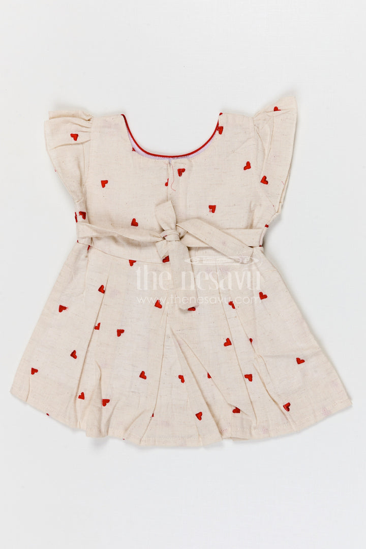 The Nesavu Baby Cotton Frocks Baby Girls Cotton Embroidered Frock with Heart Motifs and Bow Detail Nesavu Nesavu baby girls cotton embroidered frock with heart design for cute everyday wear