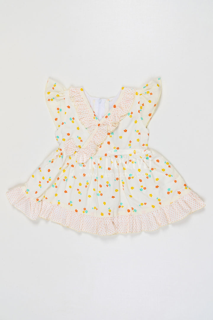 The Nesavu Baby Cotton Frocks Baby Girls Cotton Printed Frock with Colorful Floral Pattern Nesavu 14 (6M) / Yellow / Cotton BFJ969A-14 Nesavu baby girls cotton floral printed frock for summer outings and casual wear