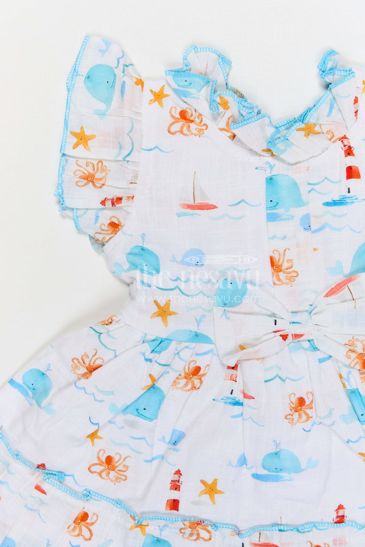 The Nesavu Baby Cotton Frocks Baby Girls Cotton Printed Frock with Cute Ocean Theme Design Nesavu Nesavu baby girls cotton frock with ocean themed digital print for summer wear