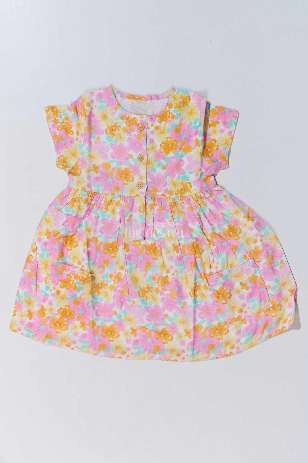 The Nesavu Baby Cotton Frocks Baby Girls Flower Print Frock with Button-Down Front and Side Pockets for a Cute Everyday Look Nesavu 10 (NB) / Multicolor BFJ736A-10 Nesavu Baby Girls Flower Print Frock Button-Down Front Pockets a Cute Look