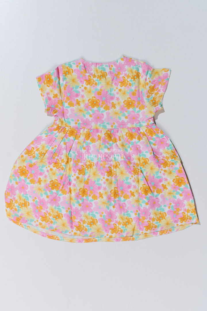 The Nesavu Baby Cotton Frocks Baby Girls Flower Print Frock with Button-Down Front and Side Pockets for a Cute Everyday Look Nesavu Nesavu Baby Girls Flower Print Frock Button-Down Front Pockets a Cute Look