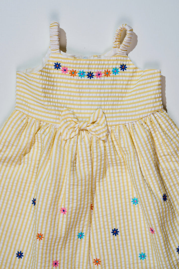 The Nesavu Baby Cotton Frocks Baby Girls Lemon Yellow Dress in Seer Sucker Cotton with Floral Embroidery and Bow Detail Nesavu Nesavu Baby Girls Lemon Yellow Dress Seer Sucker Cotton Floral Embroidery