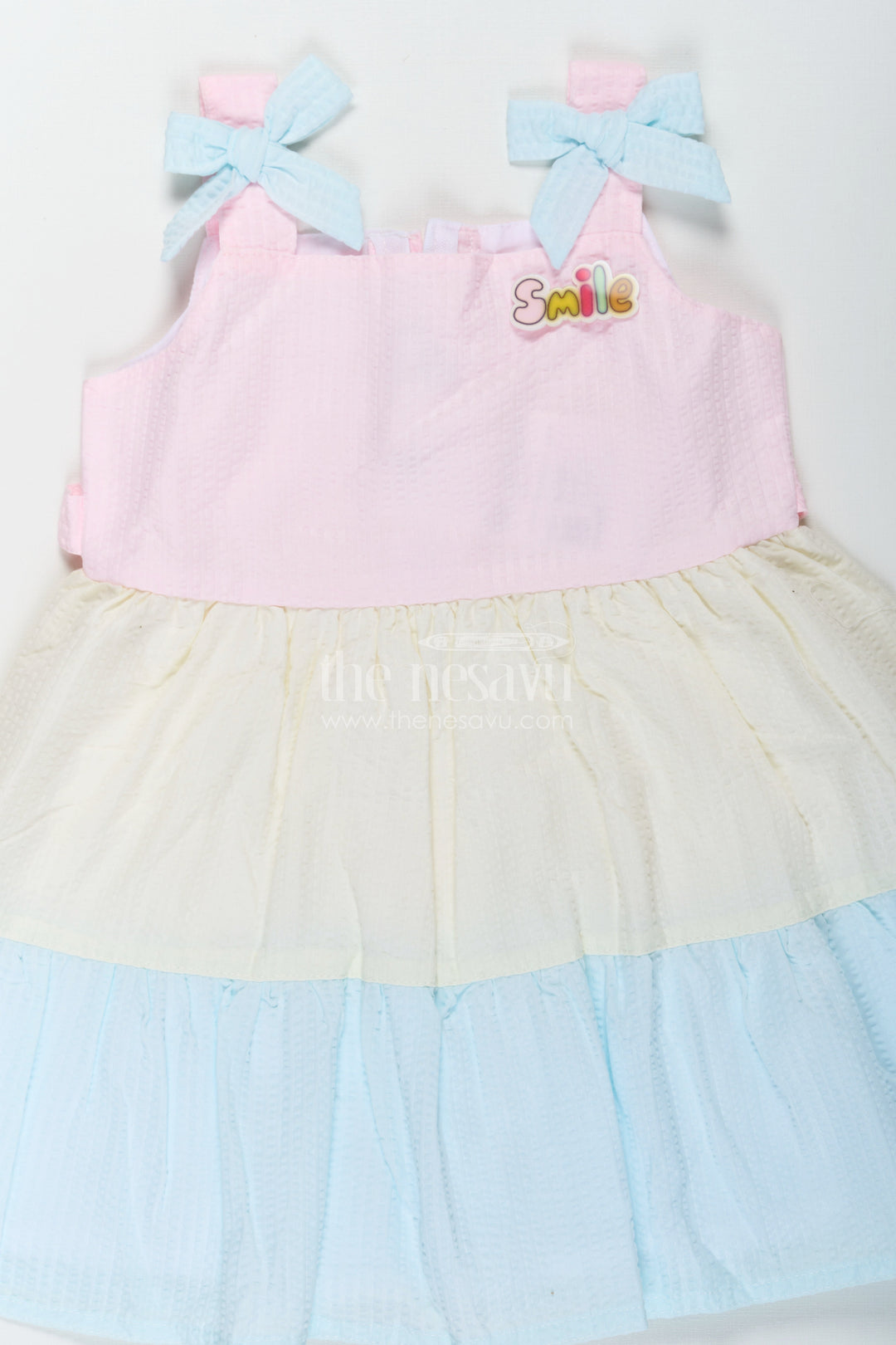 The Nesavu Baby Cotton Frocks Baby Girls Modern Short Frock in Cotton with Pastel Color Blocks and Bow Details Nesavu Nesavu Baby Girls Modern Short Frock Cotton Pastel Color Blocks Bow Details