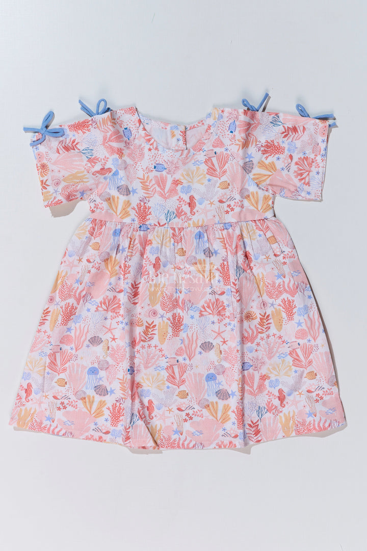 The Nesavu Baby Cotton Frocks Baby Girls Peach Frock with Ocean-Inspired Print and Tie-Up Sleeves for a Charming Look Nesavu 10 (NB) / Peach BFJ735A-10 Nesavu Baby Girls Peach Frock Ocean Print Tie-Up Sleeves Playful Outfits