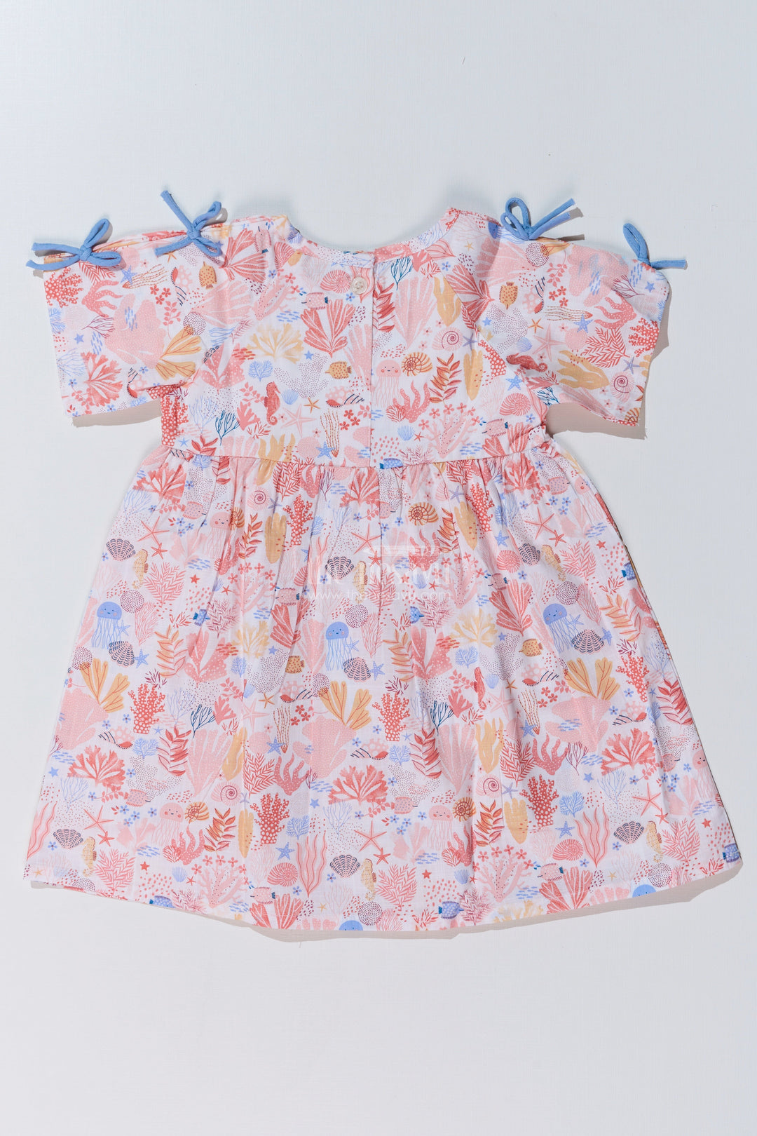 The Nesavu Baby Cotton Frocks Baby Girls Peach Frock with Ocean-Inspired Print and Tie-Up Sleeves for a Charming Look Nesavu Nesavu Baby Girls Peach Frock Ocean Print Tie-Up Sleeves Playful Outfits