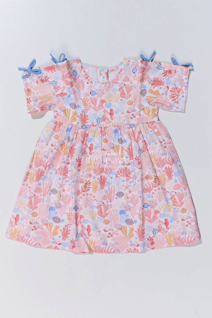 The Nesavu Baby Cotton Frocks Baby Girls Peach Frock with Ocean-Inspired Print and Tie-Up Sleeves for a Charming Look Nesavu Nesavu Baby Girls Peach Frock Ocean Print Tie-Up Sleeves Playful Outfits