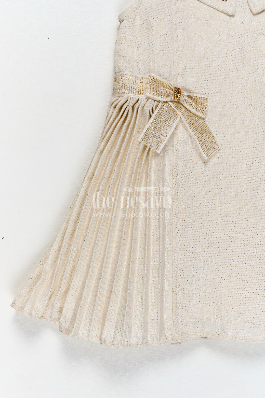 The Nesavu Girls Fancy Frock Bacchon Ki Dress Cream Girls Fancy Frock in Cotton Satin with Pleated Panels and Glitter Bow Accents Nesavu Nesavu Bacchon Ki Dress Cream Girls Frock Cotton Satin Glitter Bows Elegant Pleats