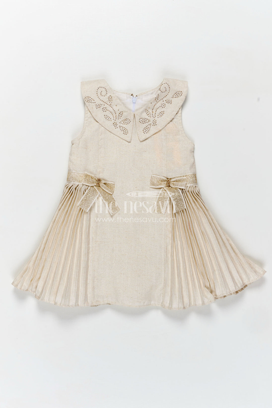 The Nesavu Girls Fancy Frock Bacchon Ki Dress Cream Girls Fancy Frock in Cotton Satin with Pleated Panels and Glitter Bow Accents Nesavu Nesavu Bacchon Ki Dress Cream Girls Frock Cotton Satin Glitter Bows Elegant Pleats