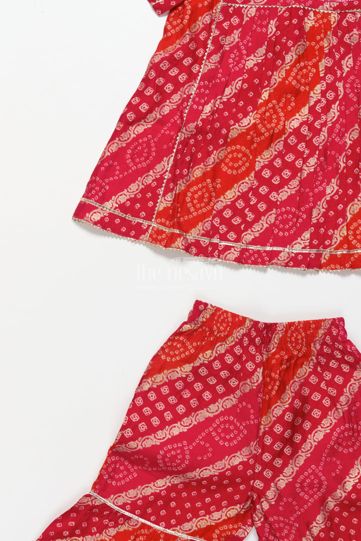 The Nesavu Girls Sharara / Plazo Set Bandhani-Inspired Festive Sharara Set with Layered Flare Nesavu Nesavu girls bandhani style festive sharara set peplum kurta layered pants