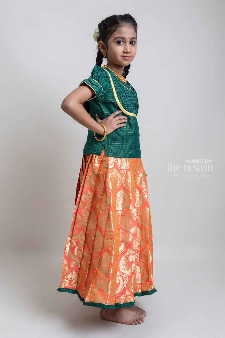 The Nesavu Pattu Pavadai Beautiful Traditional Green Semi Silk Blouse With Orange Pleated Designer Pattu Pavadai For Girls Nesavu Silk Pavada For Girls | Premium Silk Frock Onine | The Nesavu