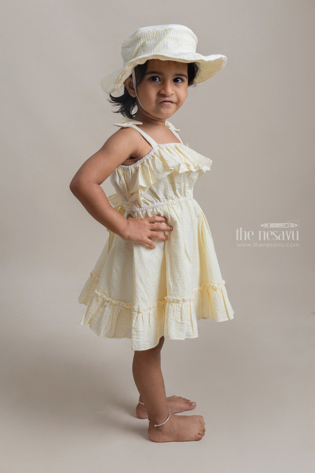 The Nesavu Baby Cotton Frocks Beautiful Yellow Striped Ruffled Pattern Cotton Frock With Matching Cap For Girls Nesavu Affordable baby cotton frocks | Premium Frocks Online | The Nesavu