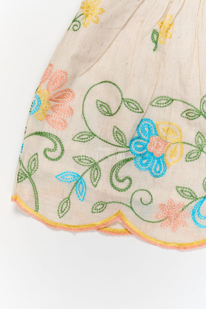 The Nesavu Baby Cotton Frocks Beige Cotton Frock with Multicolor Floral Thread Embroidery for Baby Girls Nesavu Nesavu embroidered beige cotton frock with scalloped hem for baby girls