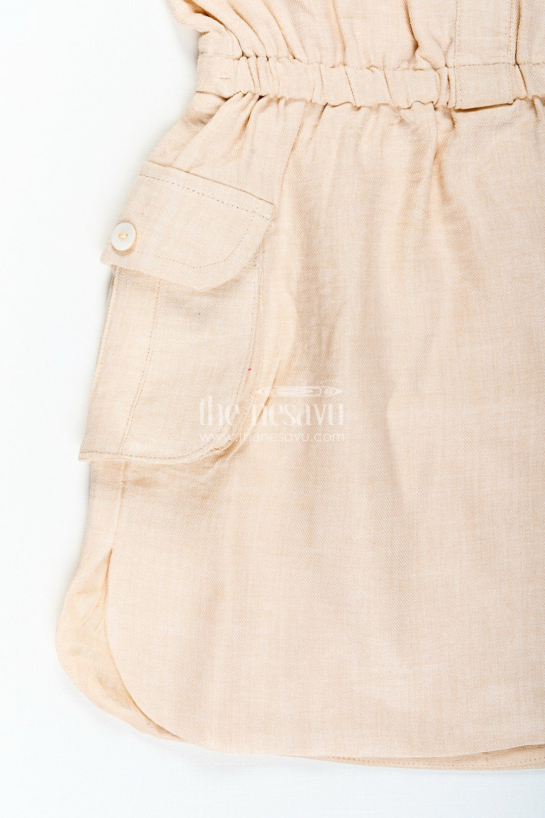 The Nesavu Girls Cotton Frock Beige girls cotton frock with collar and crochet flower patch Nesavu Nesavu beige girls cotton frock with collar and hand-crochet flower patch