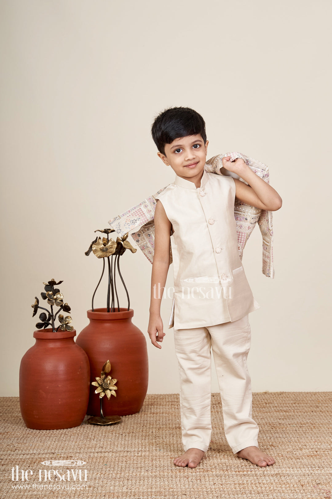 The Nesavu Boys Sherwani Beige sherwani set with multicolor mirror and thread embroidery Nesavu Nesavu beige embroidered boys sherwani with mirror and floral detailing
