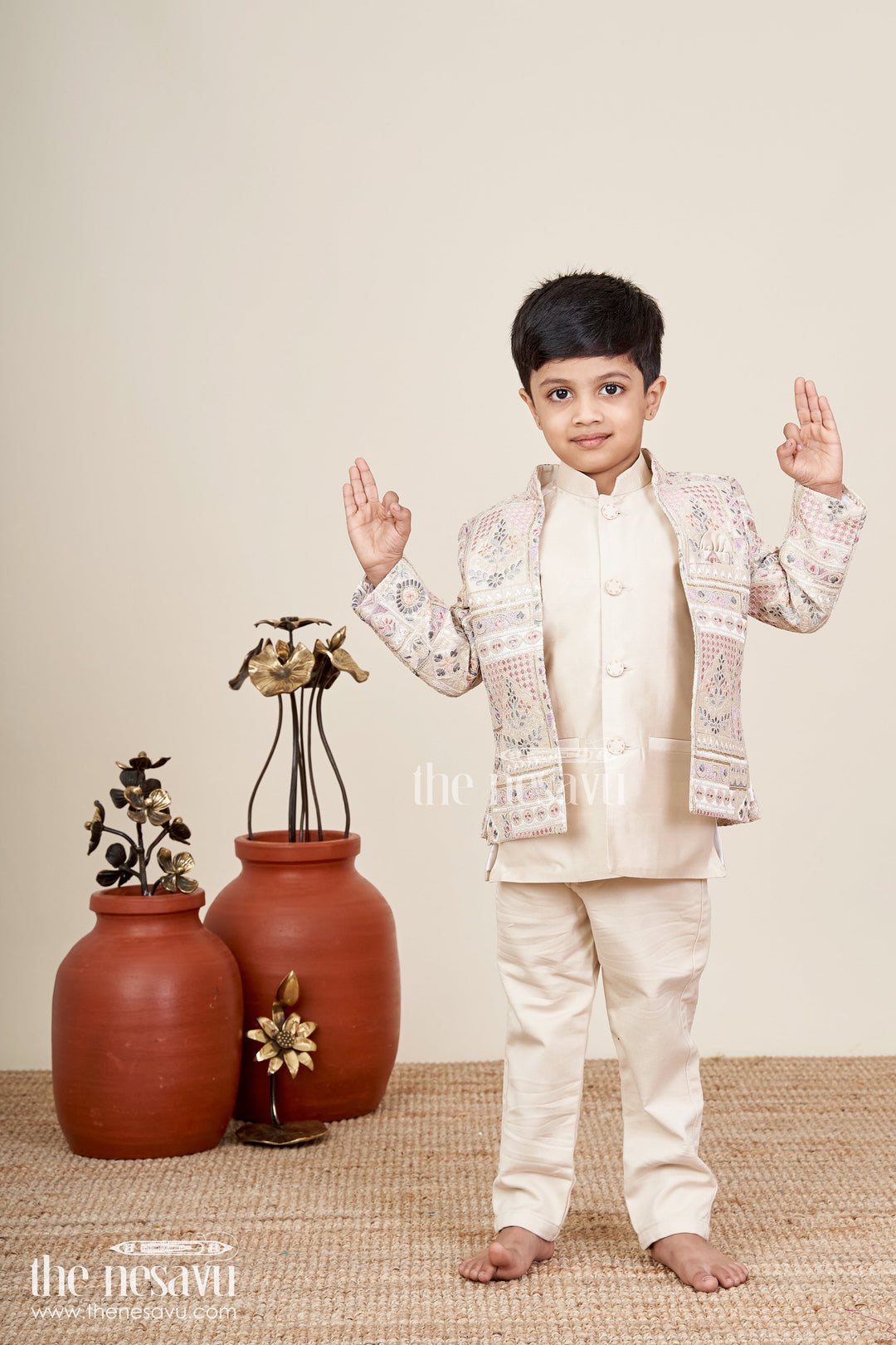 The Nesavu Boys Sherwani Beige sherwani set with multicolor mirror and thread embroidery Nesavu Nesavu beige embroidered boys sherwani with mirror and floral detailing