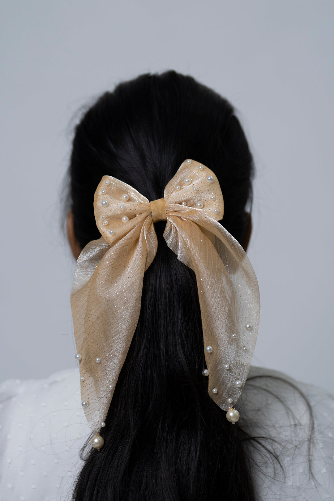 The Nesavu Scrunchies / Rubber Band Beige Sparkle Bow Hairband with Pearl Detailing Nesavu Beige JHS26B Beige Pearl Bow Hairband | Glamorous Sheer Accessory | The Nesavu