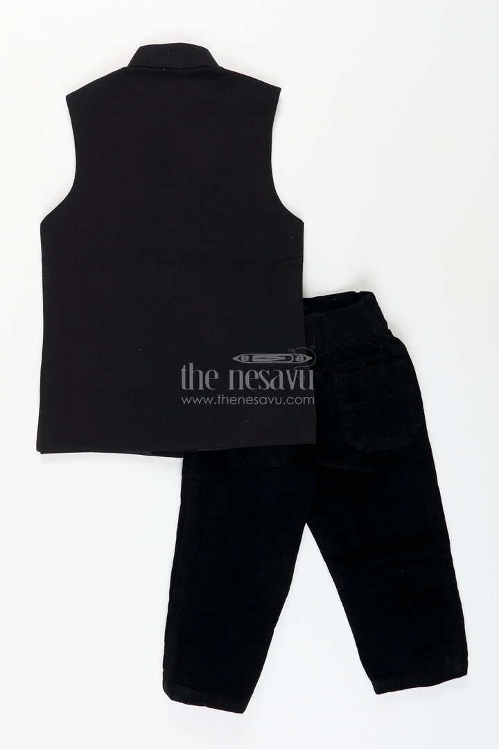 The Nesavu Boys Sherwani Black velvet floral embroidered boys sherwani with matching pants Nesavu Nesavu black velvet boys sherwani set with floral embroidery