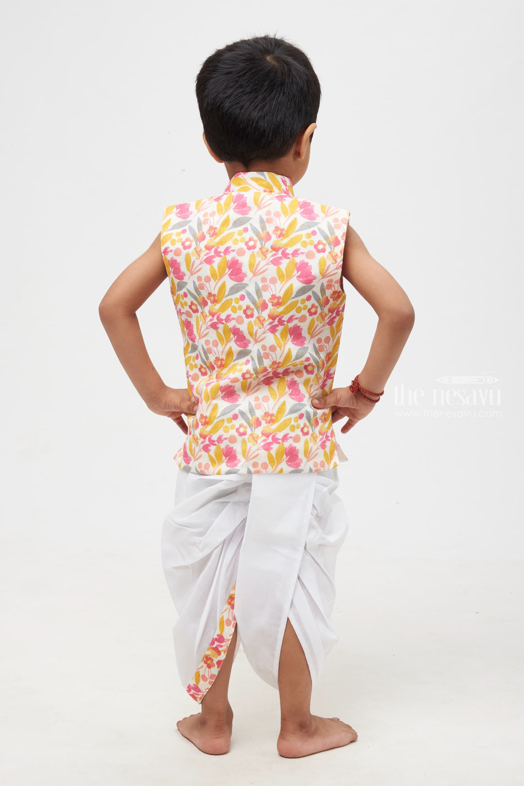 The Nesavu Boys Dothi Set Blossom Delight: Vibrant Floral Printed Kurta Shirt with White Dhoti Set for Boys Nesavu Boys Floral Kurta Shirt with White Dhoti | Festive Attire for Celebrations | The Nesavu