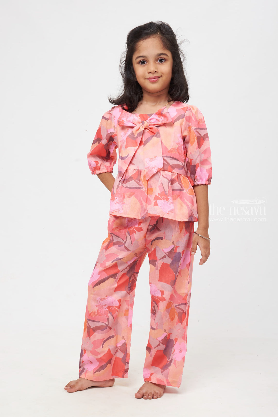 The Nesavu Girls Sharara / Plazo Set Blossom Radiance Tiered Peplum Set with Abstract Floral Design for Young Fashionistas Nesavu 24 (5Y) / Pink / linen cotton GPS212A-24 Abstract Floral Tiered Peplum Set | Blooming Chic Kids Collection | Vibrant Youthful Outfits - The Nesavu