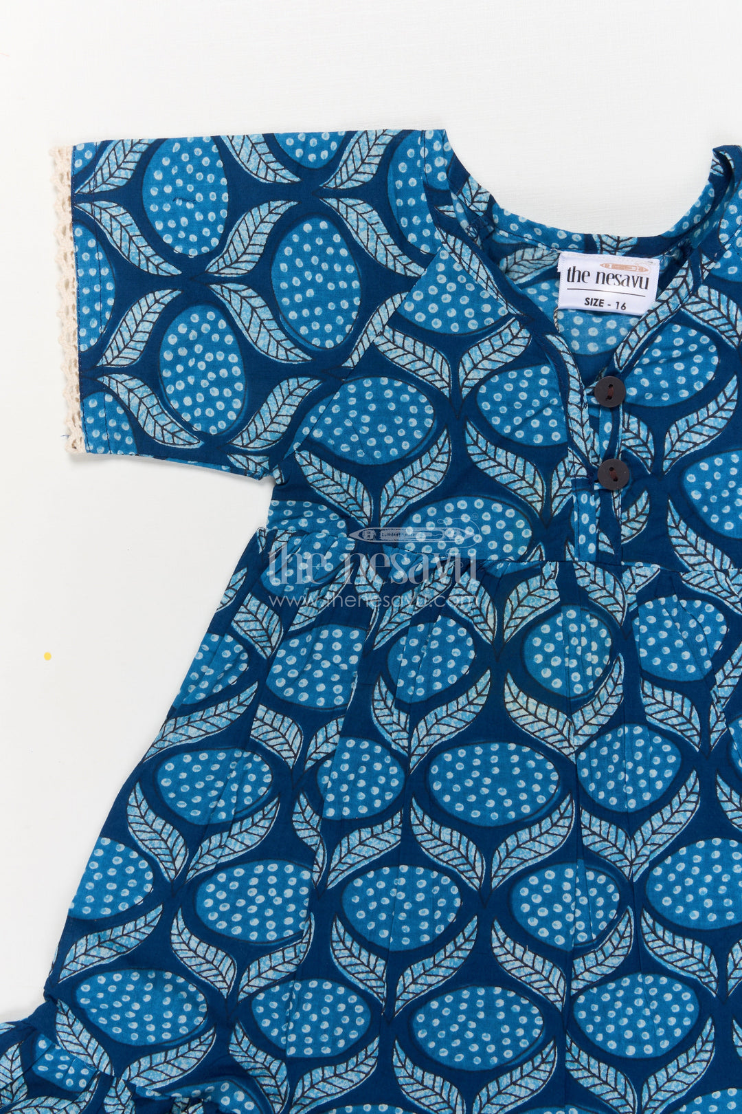 The Nesavu Girls Cotton Frock Blue Cotton Frock for Baby Girls with Wave Print and Flared Silhouette Nesavu Nesavu blue cotton frock for baby girls with wave print and flared sleeves – summer-ready look