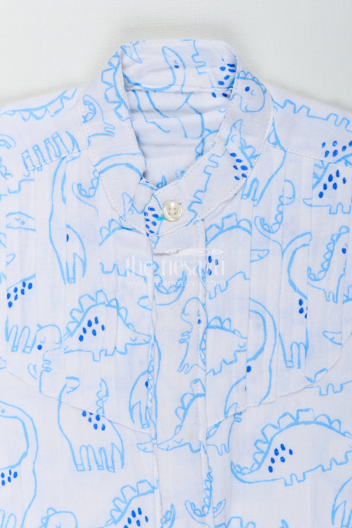 The Nesavu Boys Cotton Shirt Blue Dino Print Boys Shirt in Muslin Cotton Playful and Smart Design Nesavu Nesavu Boys Muslin Cotton Dinosaur Shirt Blue Dino Prints Lightweight Everyday Comfort