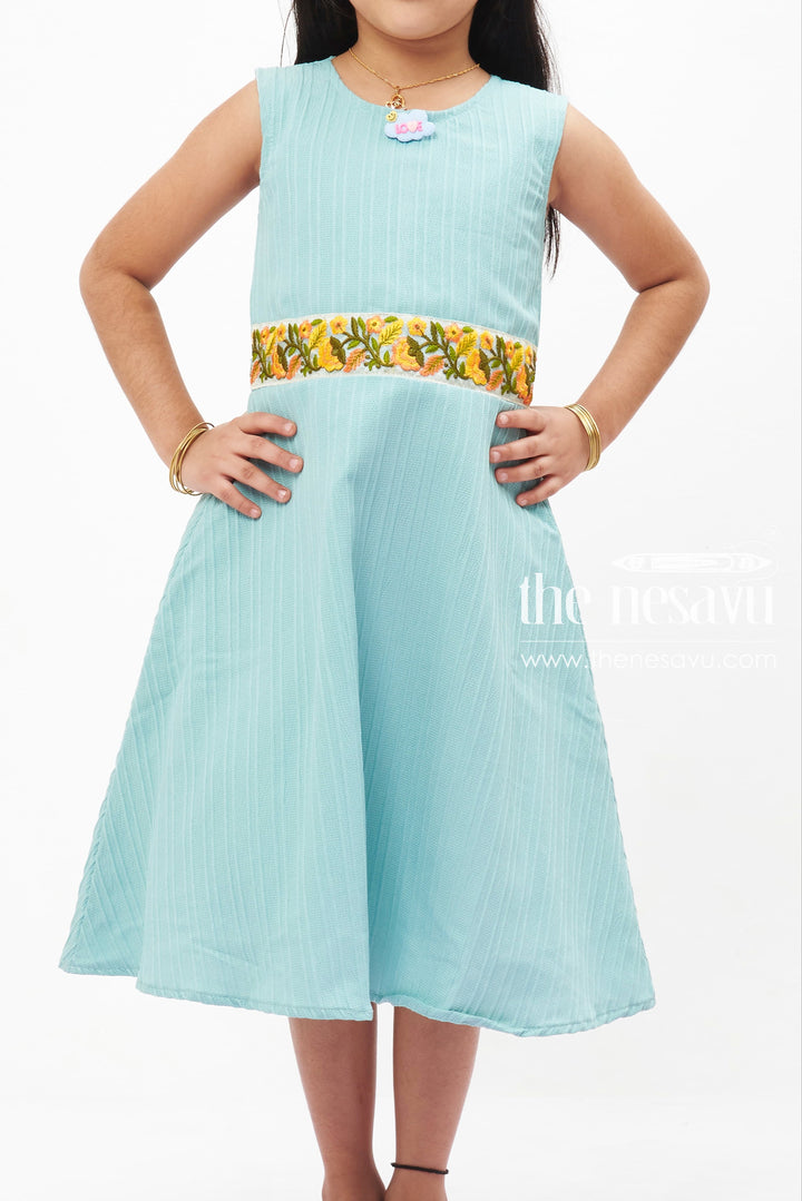 The Nesavu Girls Fancy Frock Blue Dream Pleated Frock: Refreshing Teal with Floral Accent for Girls Nesavu Girls' Teal Pleated Summer Dress | Sleeveless Floral Accent Frock | The Nesavu