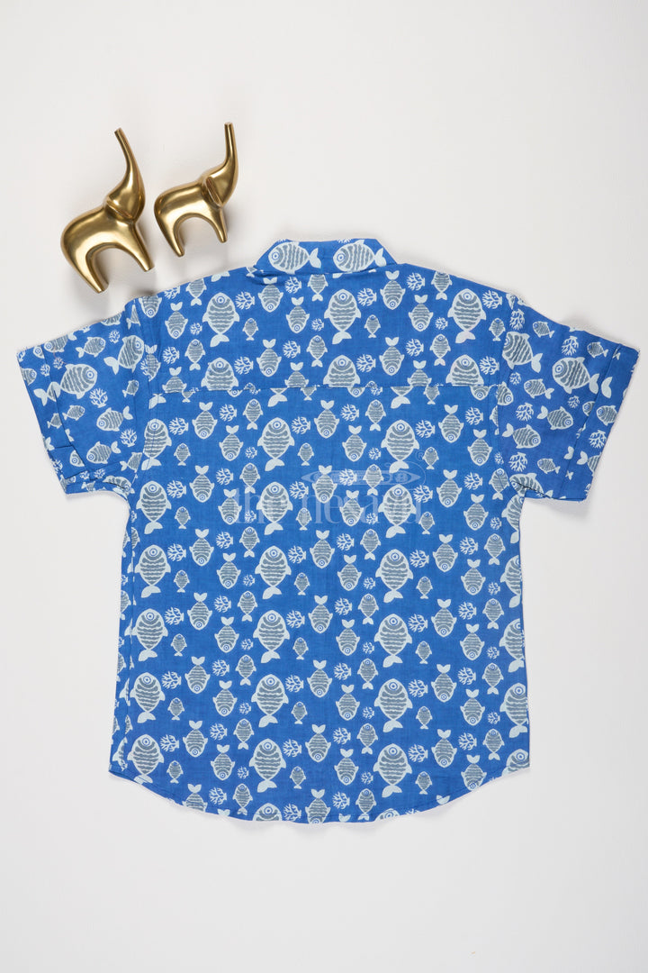 The Nesavu Boys Cotton Shirt Boys Blue Cotton Short-Sleeve Shirt with Whimsical Fish Print for Casual Summer Wear Nesavu Nesavu Boys Blue Cotton Shirt Fun Fish Print Summer Outings Casual Wear