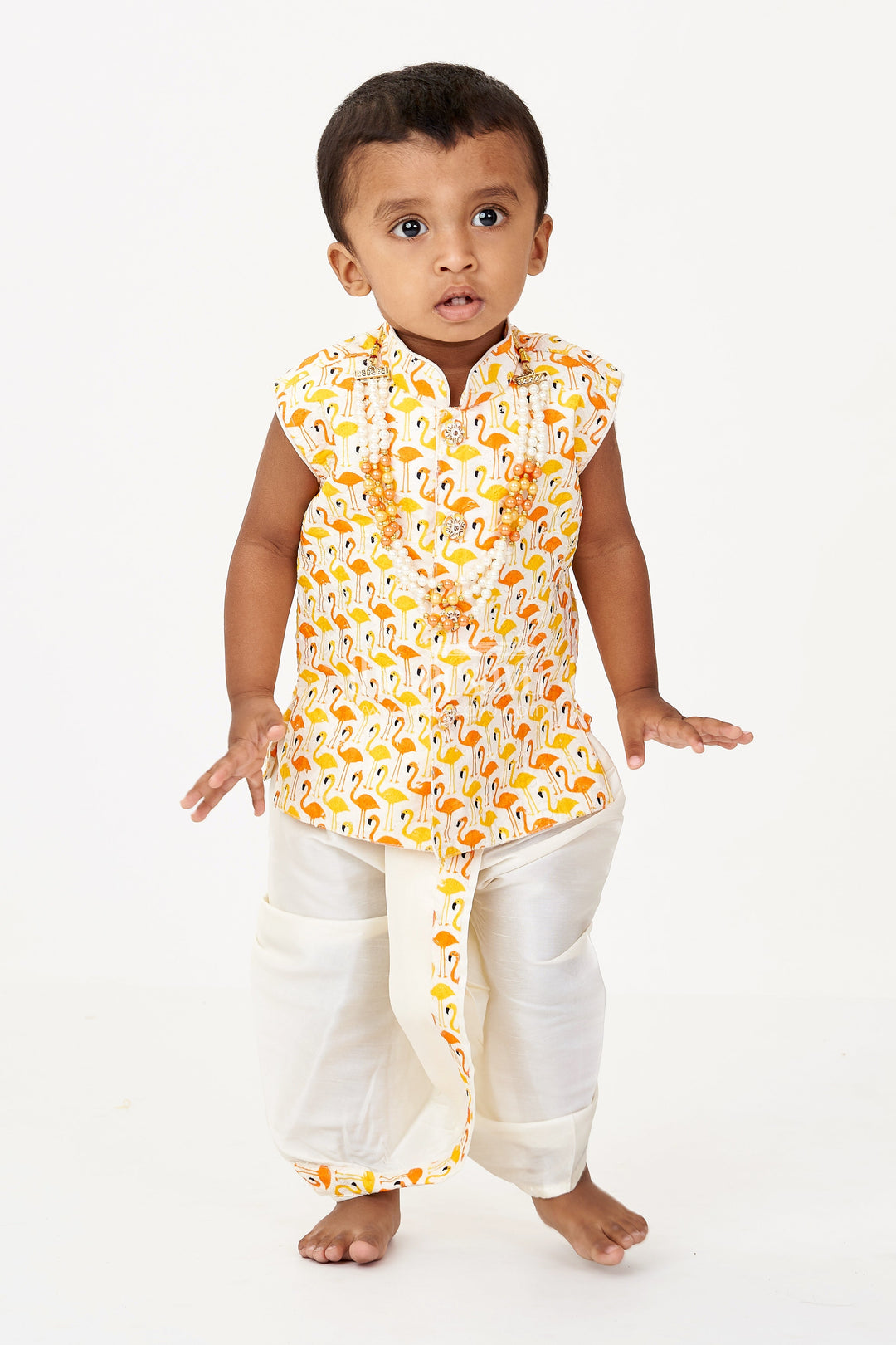 The Nesavu Boys Dothi Set Boys Cotton Dhoti Pant Set with Yellow and Orange Flamingo Print Jacket in Cotton Blend Nesavu 12 (3M) / Yellow BES684A-12 Nesavu Boys Cotton Dhoti Pant Set Flamingo Printed Sleeveless Jacket Cream Bottom