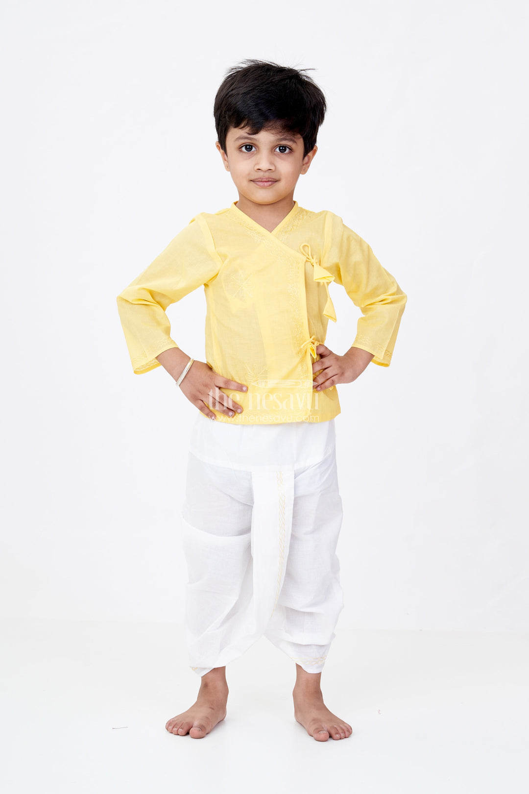 The Nesavu Boys Dothi Set Boys Dhoti Kurtha Set in Yellow Cotton with Embroidered Tie Wrap Style and Contrasting Dhoti Pants Nesavu Nesavu Boys Cotton Dhoti Kurtha Set Embroidery Wrap Tie Design Festive Yellow