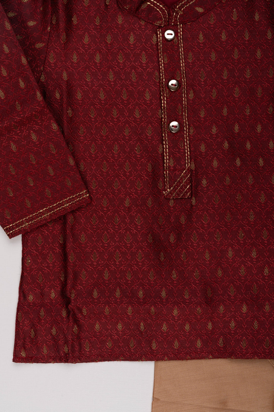 The Nesavu Boys Kurtha Set Boys Elegant Butta Printed Maroon Kurta with Beige Pant Set Nesavu Boys Butta Printed Maroon Kurta Set: Mandarin Collared with Beige Pants - Traditional Festive Elegance | The Nesavu