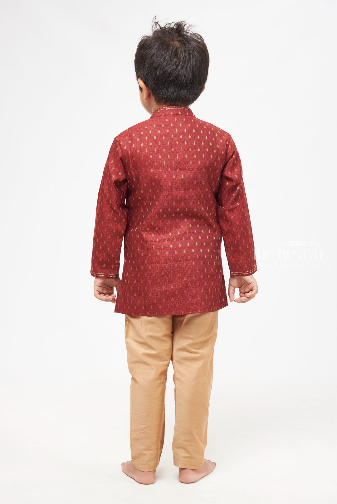 The Nesavu Boys Kurtha Set Boys Elegant Butta Printed Maroon Kurta with Beige Pant Set Nesavu Boys Butta Printed Maroon Kurta Set: Mandarin Collared with Beige Pants - Traditional Festive Elegance | The Nesavu