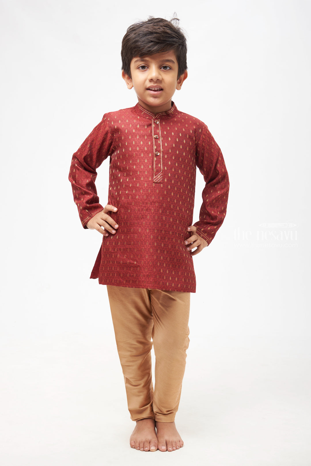 The Nesavu Boys Kurtha Set Boys Elegant Butta Printed Maroon Kurta with Beige Pant Set Nesavu Boys Butta Printed Maroon Kurta Set: Mandarin Collared with Beige Pants - Traditional Festive Elegance | The Nesavu