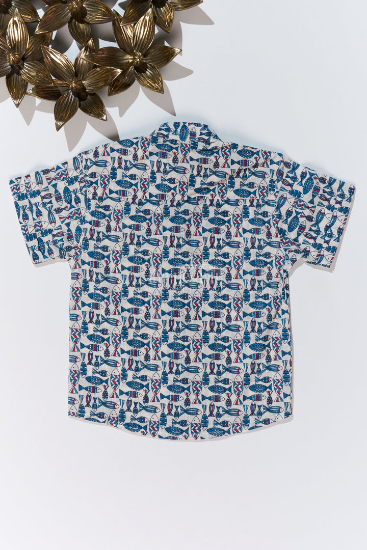 The Nesavu Boys Cotton Shirt Boys Holiday Shirt Dress in Cotton Block Print with Traditional Fish Motif for a Relaxed Look Nesavu Nesavu Boys Holiday Shirt Dress Cotton Block Print Traditional Fish Motif