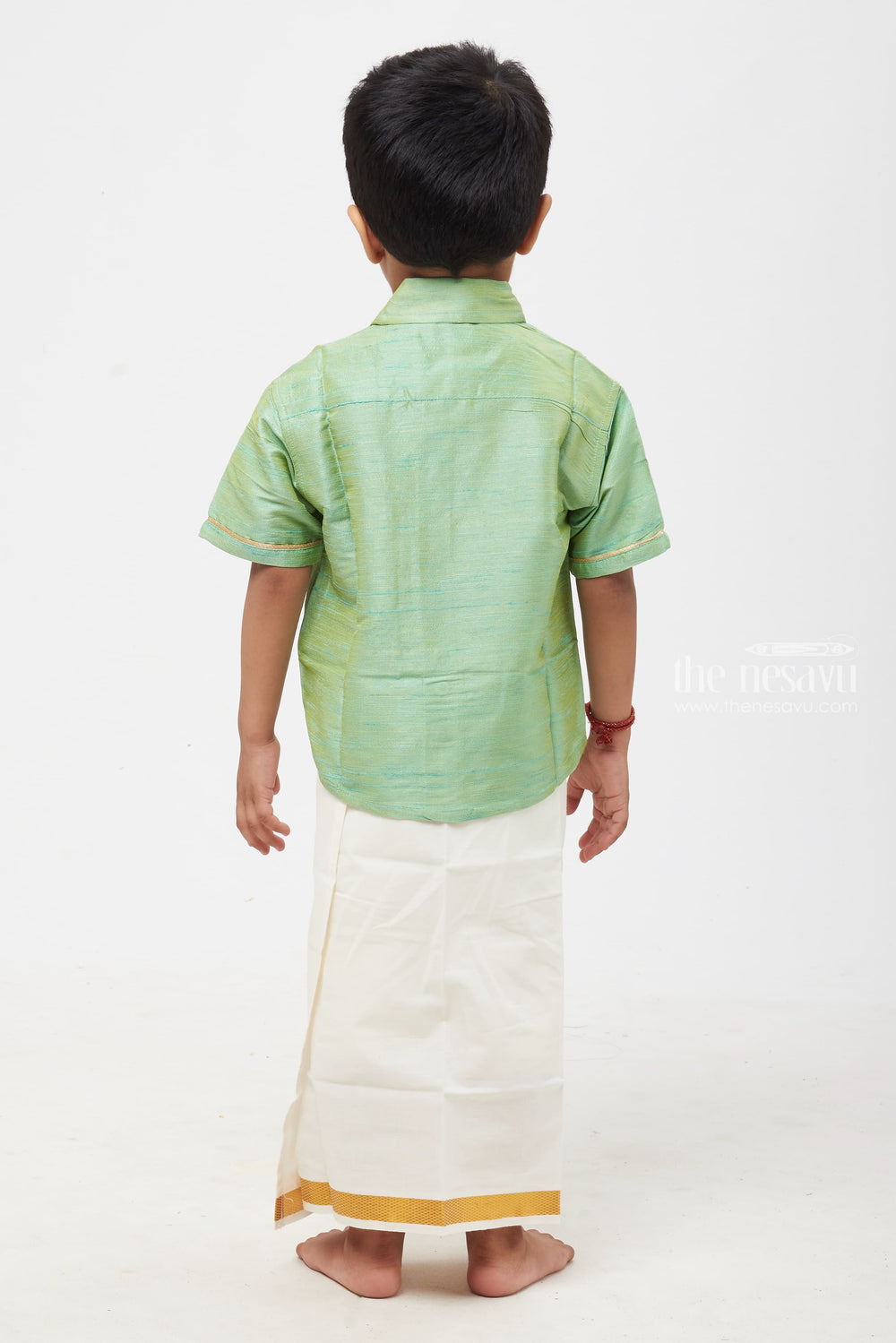 The Nesavu Boys Silk Shirt Boys Lustrous Sea Green Silk Shirt: Journey into the Heart of Nature's Charm Nesavu Boys Enchanting Sea Green Silk Shirt: Natures Essence Embodied in Silken Elegance | The Nesavu