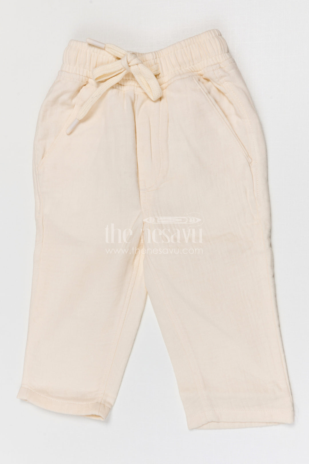 The Nesavu Boys Pant Boys Muslin Cotton Pants for Summer Outings and Relaxed Daily Wear Nesavu 16 (1Y) / Beige / Muslin Cotton BWP031E-16 Nesavu boys muslin cotton pants for summer outings breathable kids casual drawstring pants