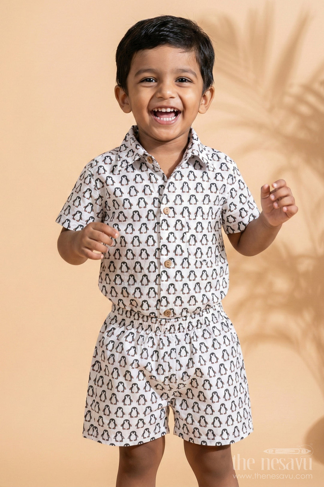 The Nesavu Boys Casual Set Boys Smart and Casual Wear Set with Penguin Print Shirt and Matching Shorts in Cool Cotton Fabric Nesavu 16 (1Y) / Black BCS274A-16 Nesavu Boys Smart Casual Wear Cotton Set All-Over Penguin Print Shirt Shorts