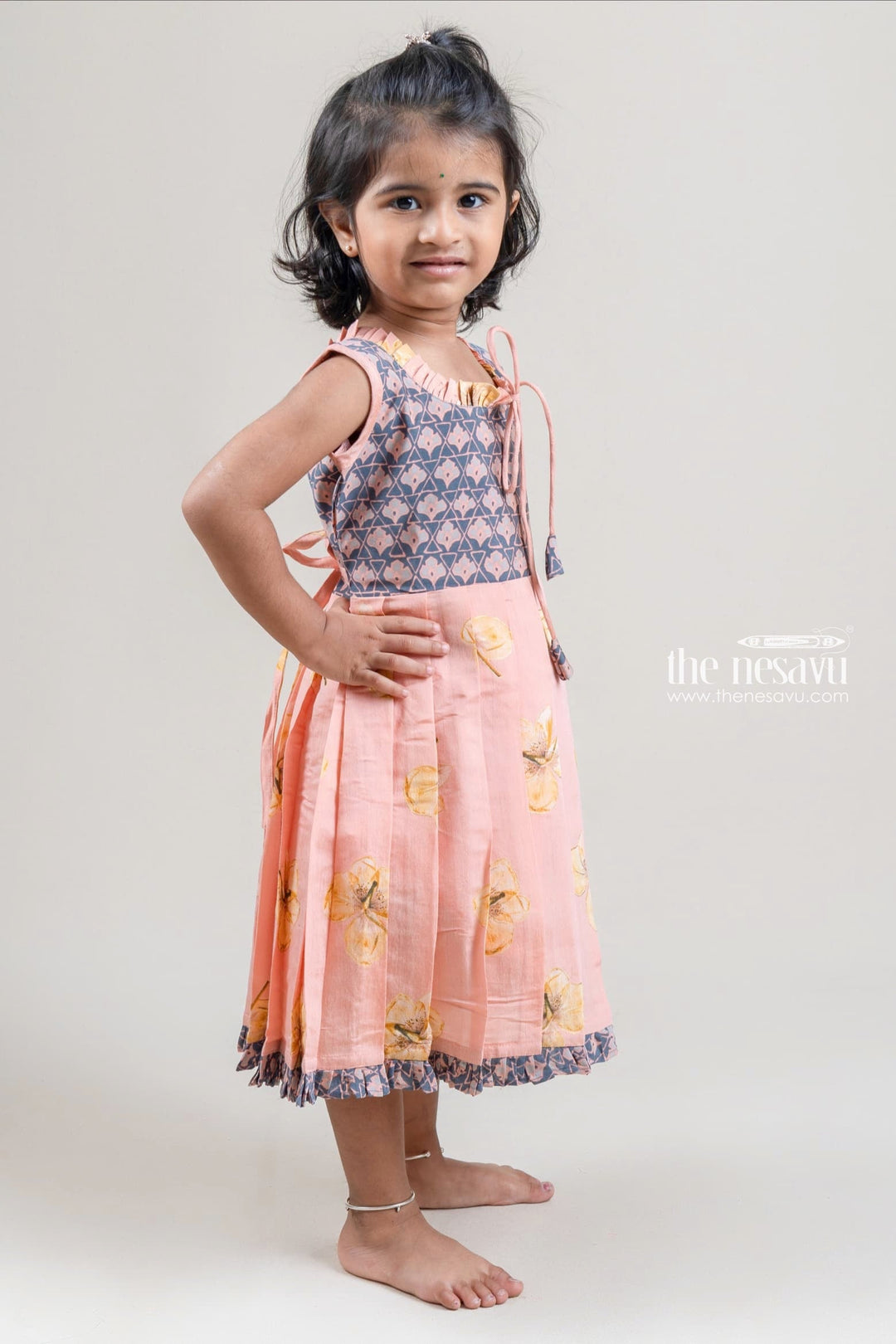 The Nesavu Girls Fancy Frock Bright and Beautiful Chanderi Floral Printed Cotton Frocks for Girls Nesavu Stylish Floral Printed Cotton Frocks for Girls | Cotton Frock | Shop at The Nesavu