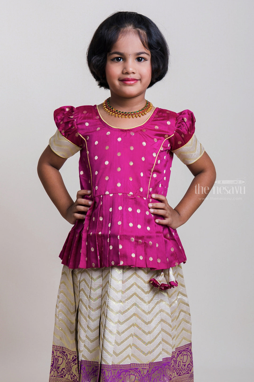 The Nesavu Pattu Pavadai Brocade Printed Pleated Pink Peplum Blouse And Half-White Silk Skirt For Girls Nesavu Top 5 Pink Pattu Pavada Dresses| Stylish Pattu Pavada For Girls | The Nesavu